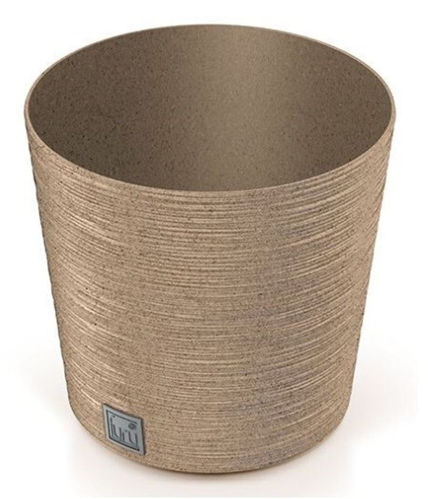 A round, low planter pot with a textured surface.
