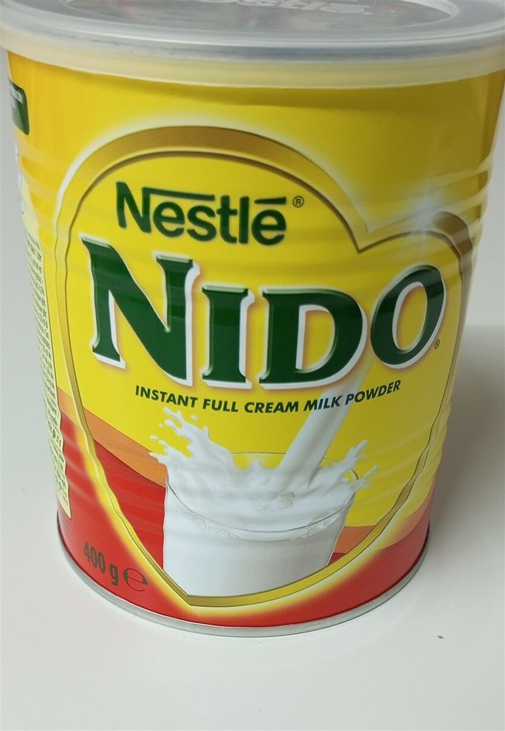A close-up shot of a Nestlé Nido instant full cream milk powder can.