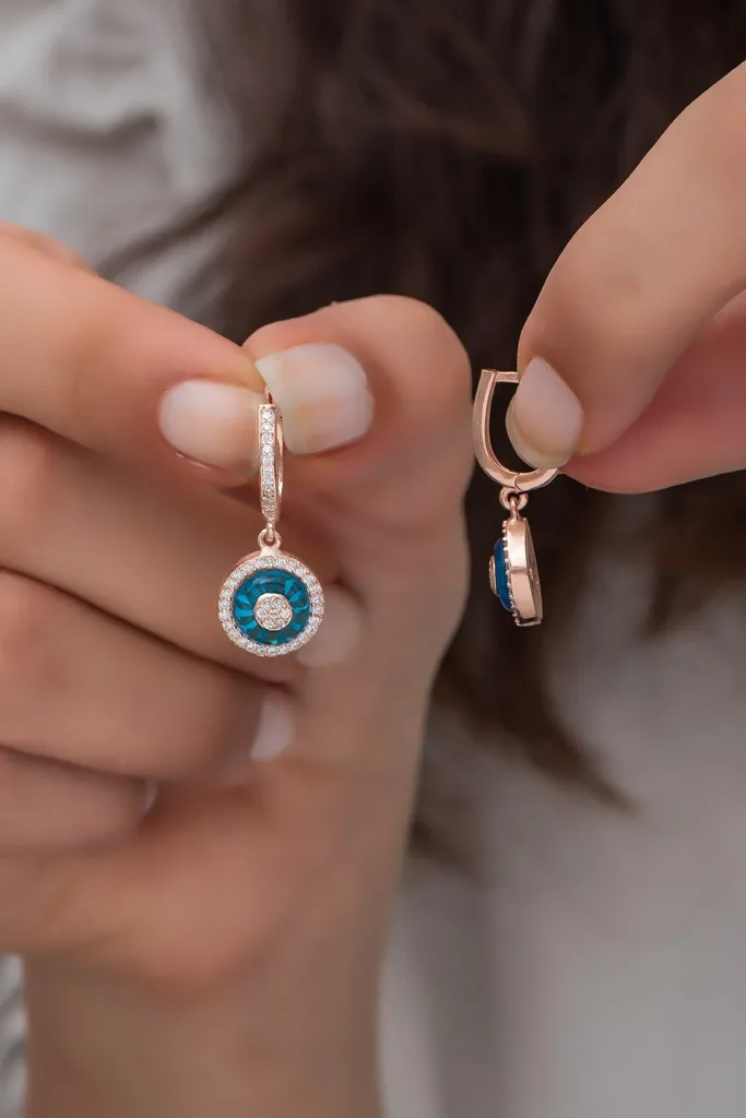 Boucles d'oreilles œil or rose et argent 925 avec pavage de zircone éclatant