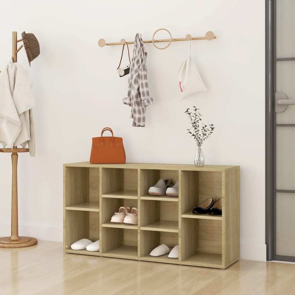 An entryway with a shoe cabinet and coat rack.