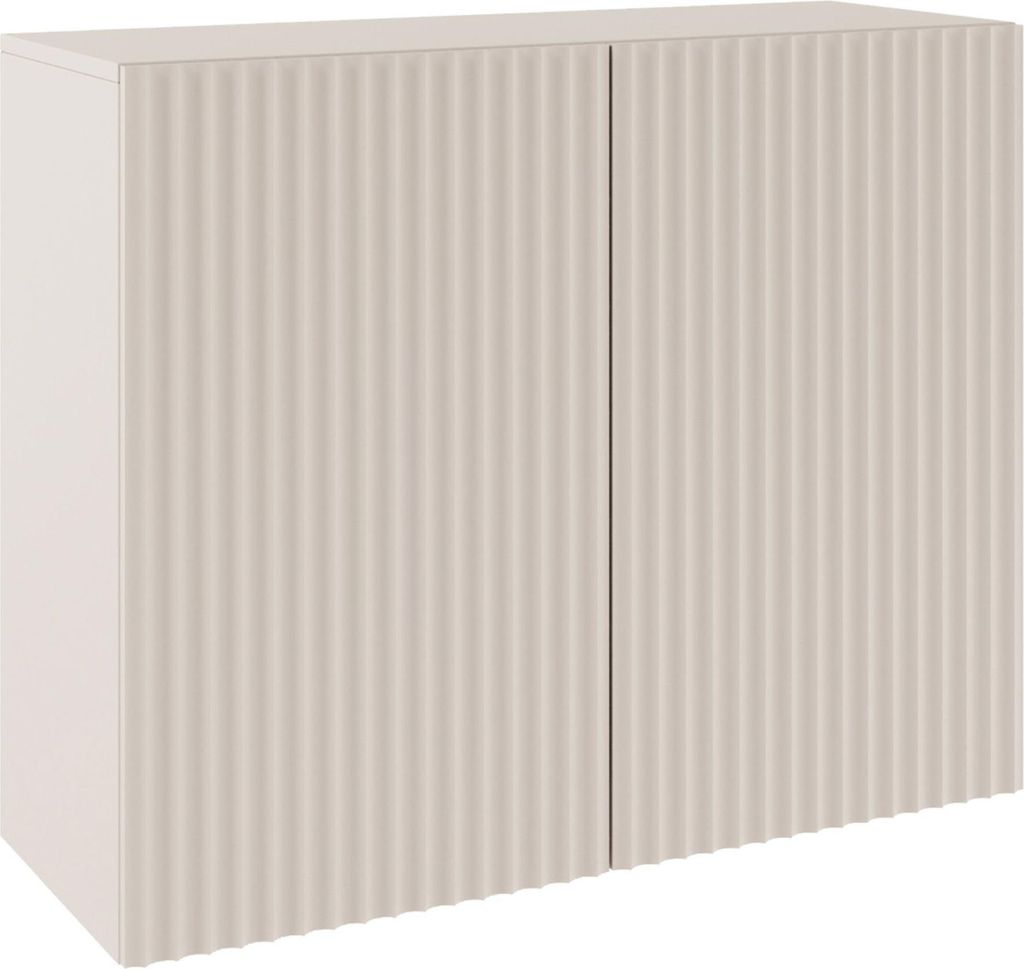 A studio shot of a two-door sideboard with ribbed fronts.