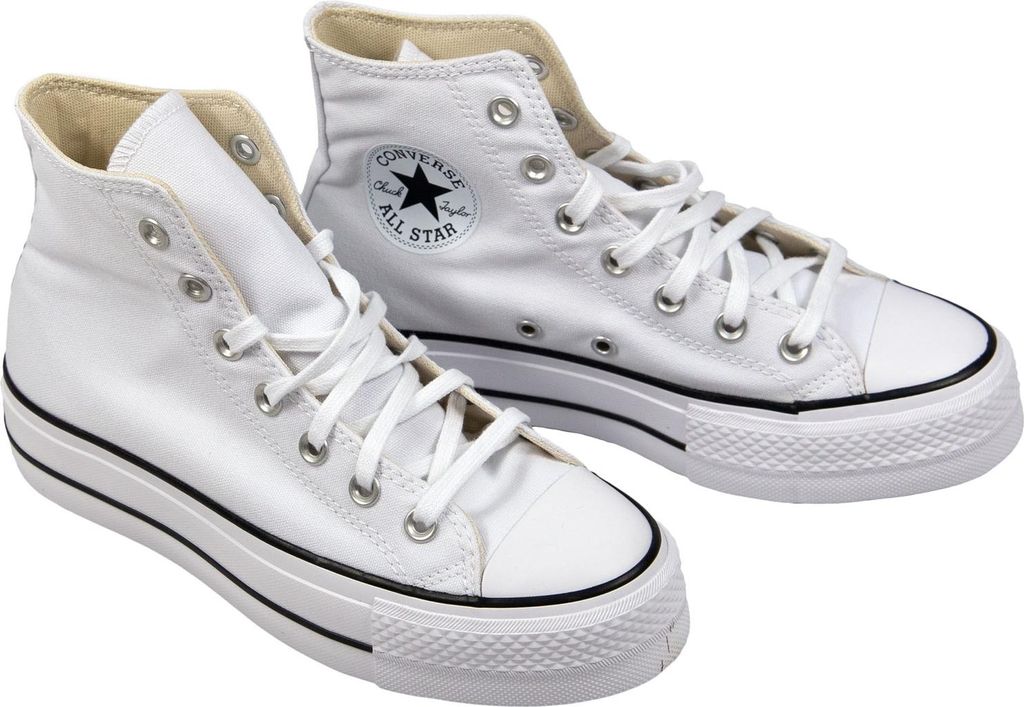 A pair of white Converse Chuck Taylor All Star high-top sneakers with platform soles, displayed against a white background.