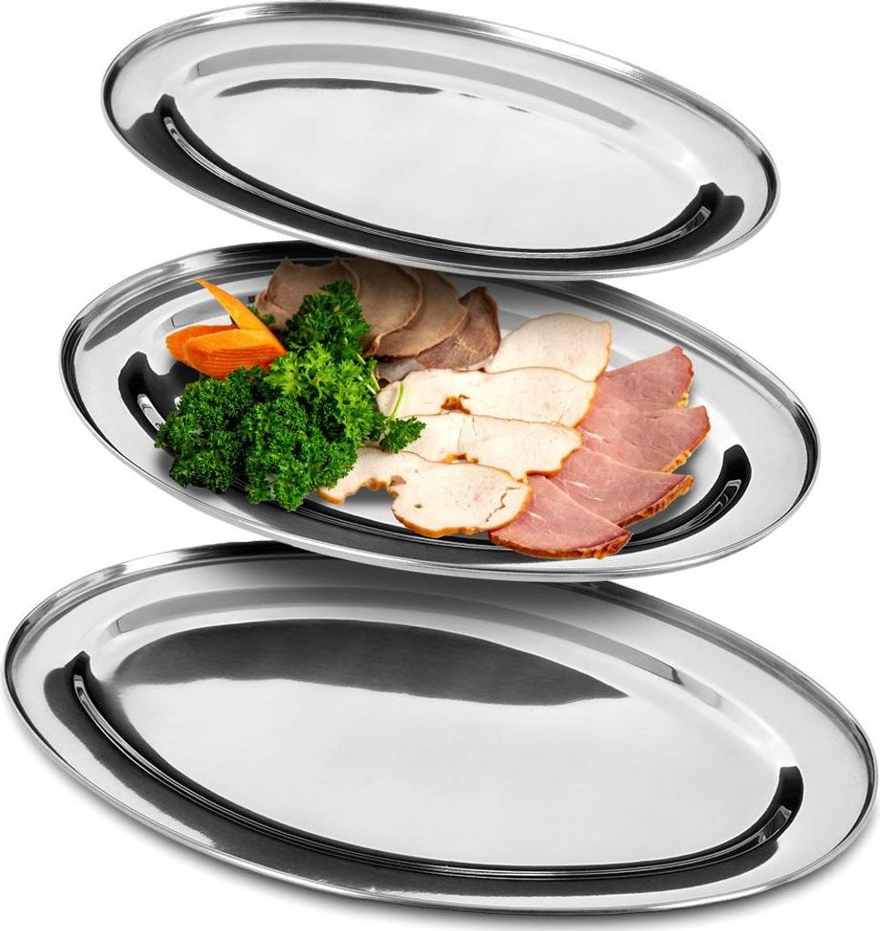 Three oval stainless steel serving platters are stacked on a white background. The middle platter contains a serving of sliced meats, broccoli, and carrots.