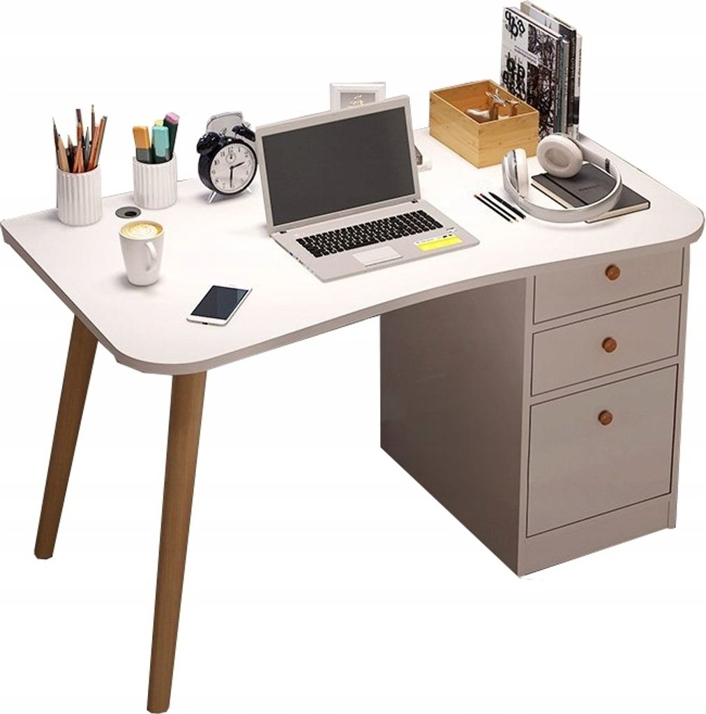 A white desk with a laptop, coffee cup, and office supplies.