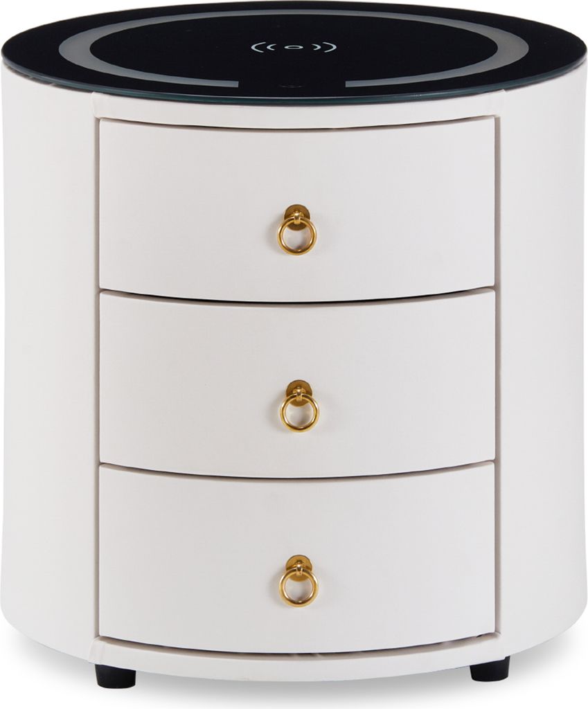 A white, cylindrical nightstand with three drawers and gold ring pulls. The top is black with a circular design and symbols indicating wireless charging.
