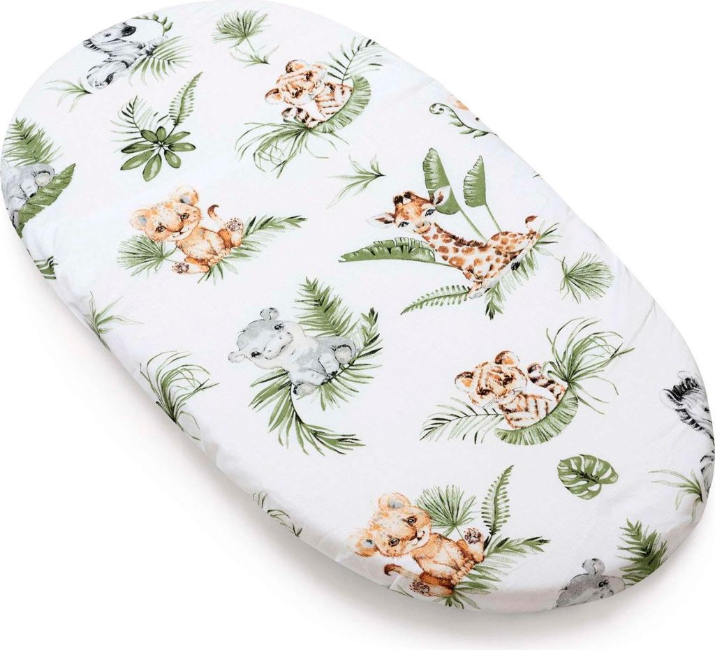A white oval-shaped baby mattress cover with a savanna-themed print of cartoon animals and leaves.