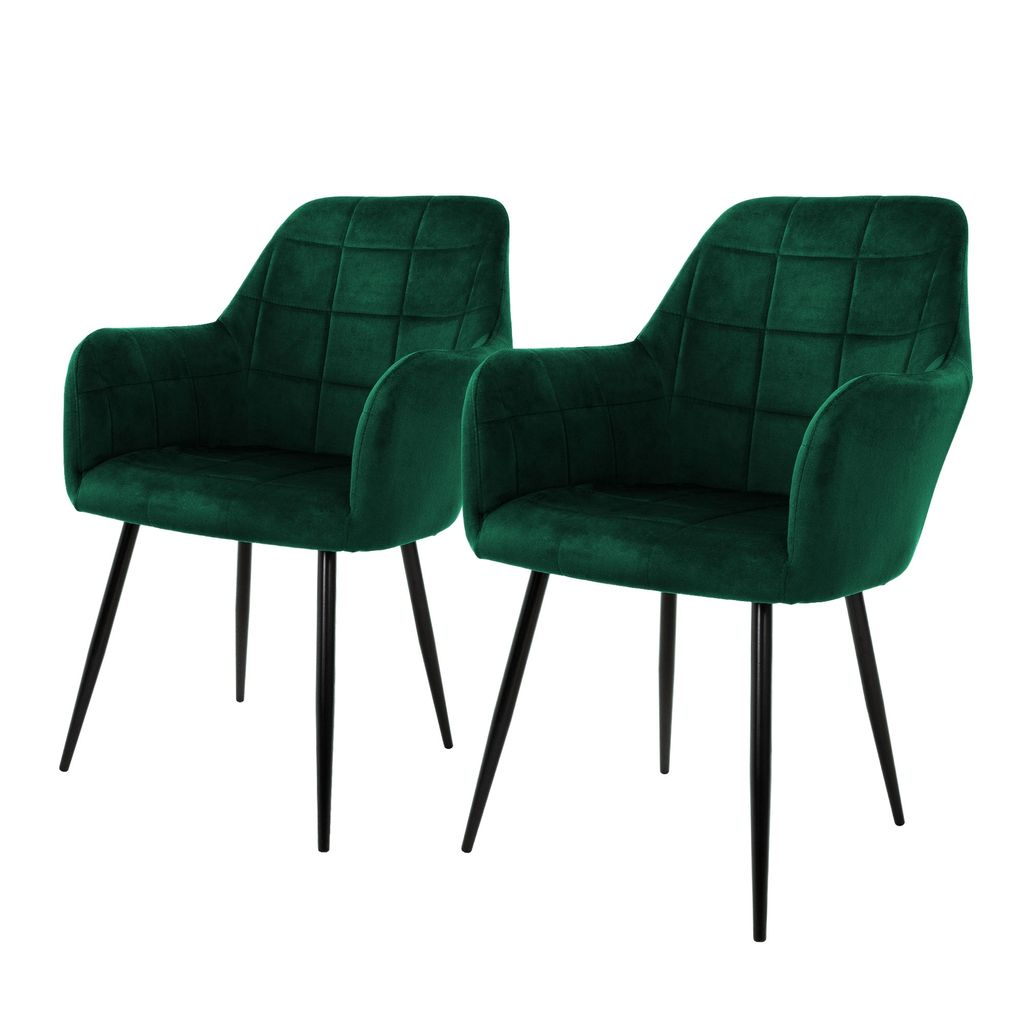 Two dark green velvet dining chairs with black metal legs are shown against a white background.