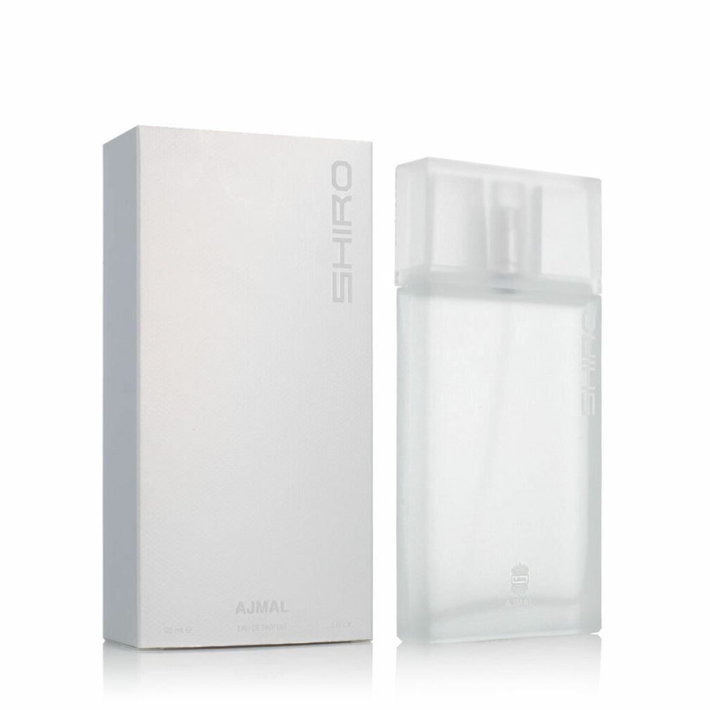 A white box and a clear bottle of perfume are shown against a white background.