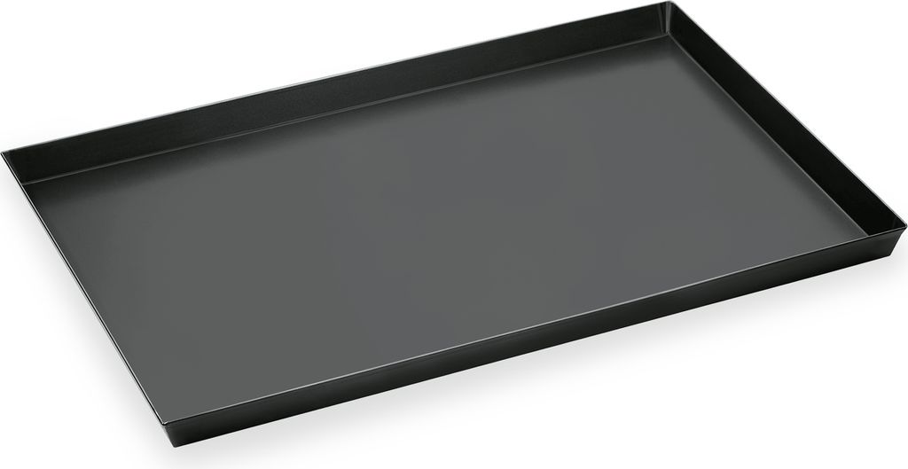 A black steel grill plate is shown from a slightly elevated angle against a light gray background.