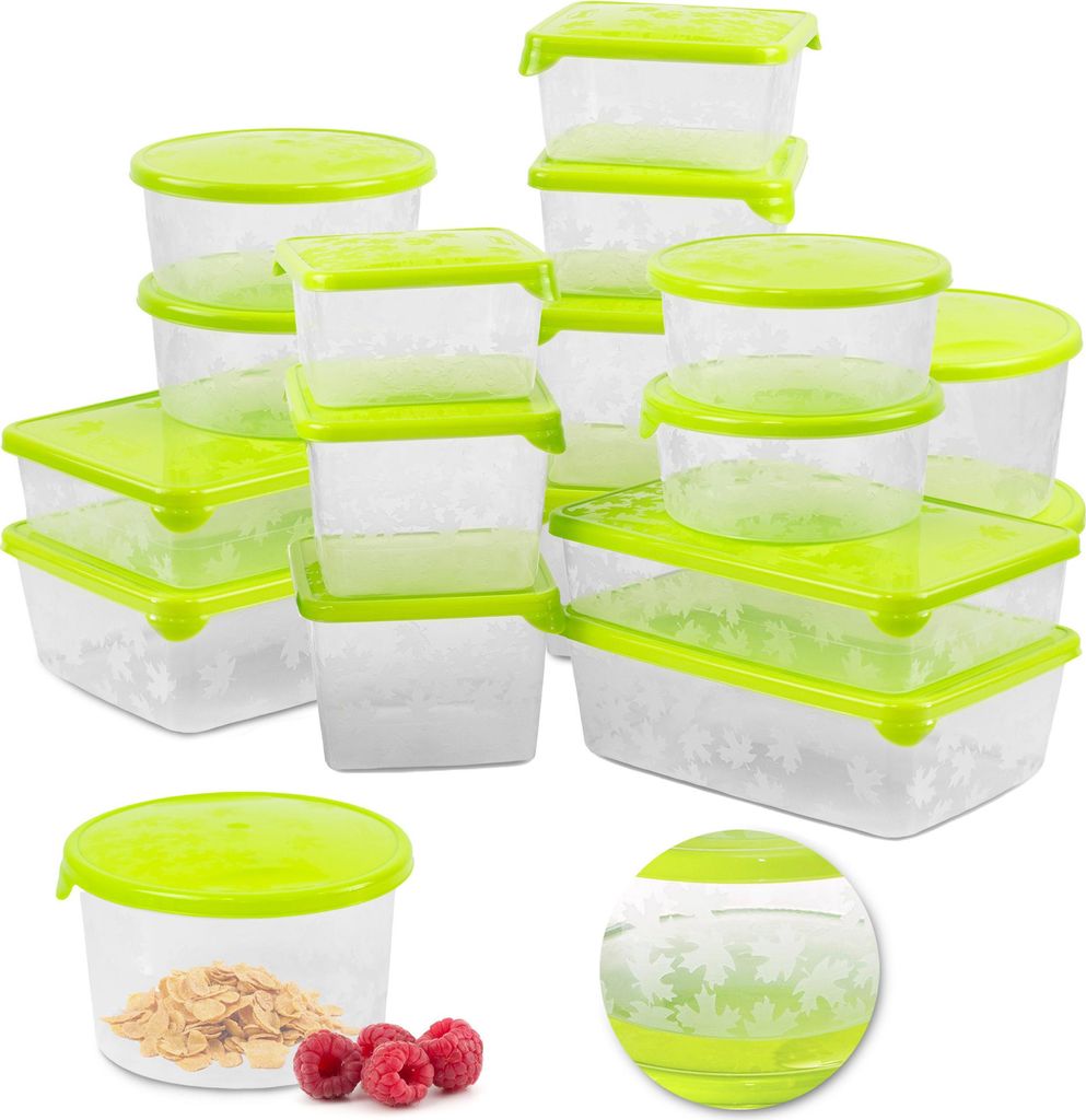 A collection of clear plastic food storage containers with green lids, arranged in a visually appealing display.