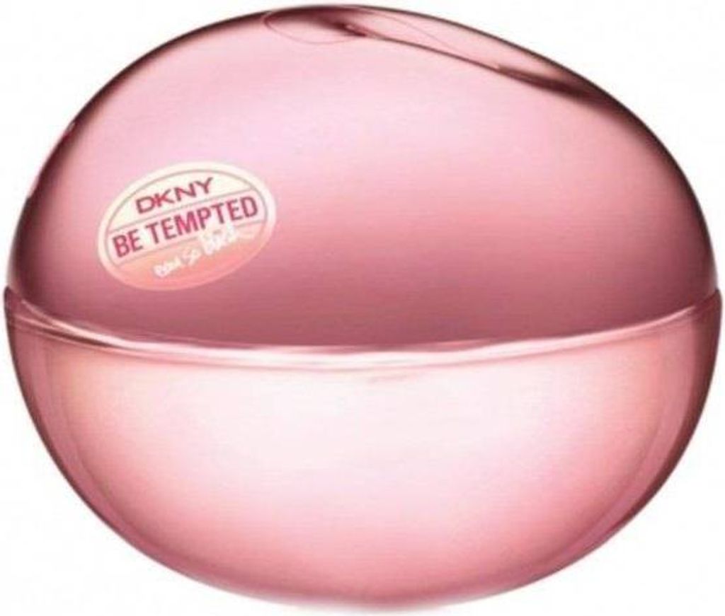 A close-up studio shot of a pink, spherical perfume bottle with a label.