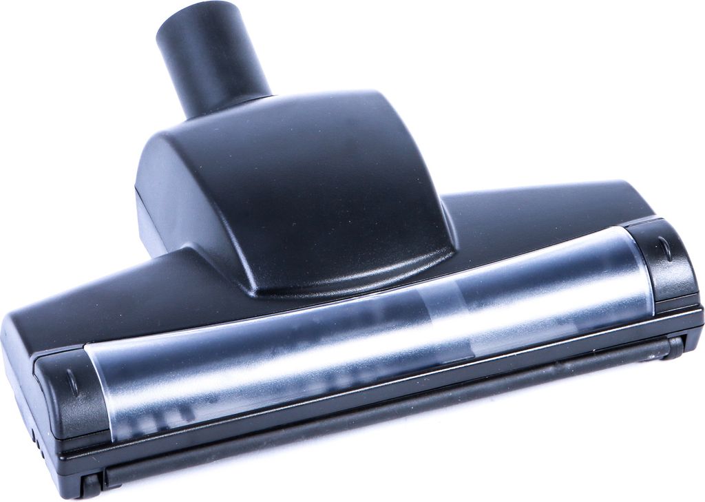 A black vacuum cleaner attachment with a clear plastic section is photographed against a white background.