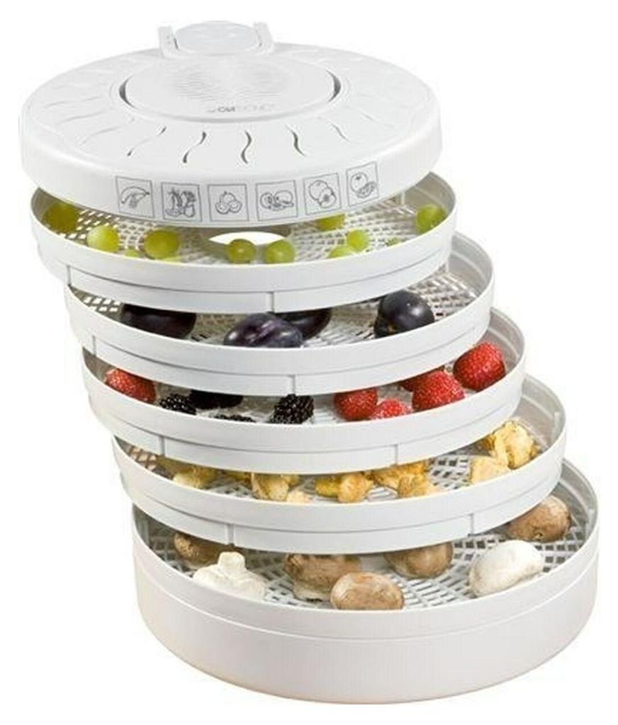 A white food dehydrator with multiple stacked trays filled with various fruits and mushrooms.