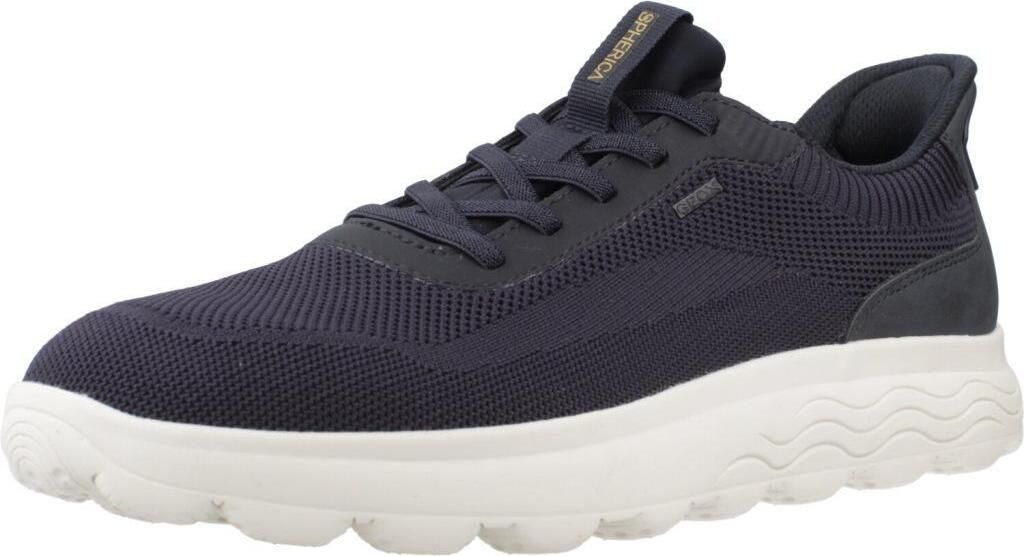 A single navy blue sneaker with a white sole is shown against a white background.