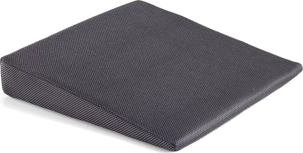 A dark gray wedge-shaped cushion on a white background.