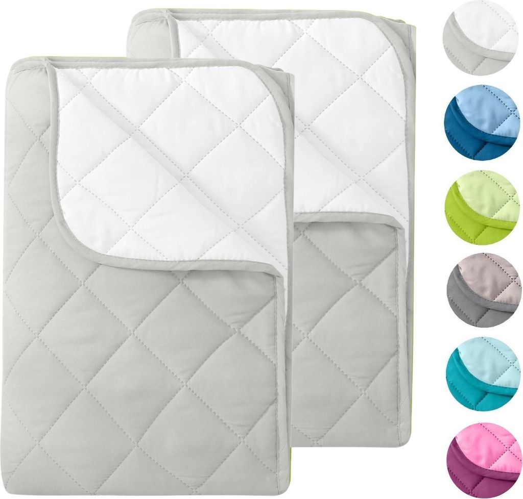 Two quilted blankets are shown laid out on a white background. To the right, there are circular swatches of different colored blankets.