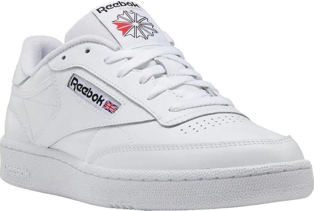 A studio shot of a single white Reebok Club C 85 sneaker.