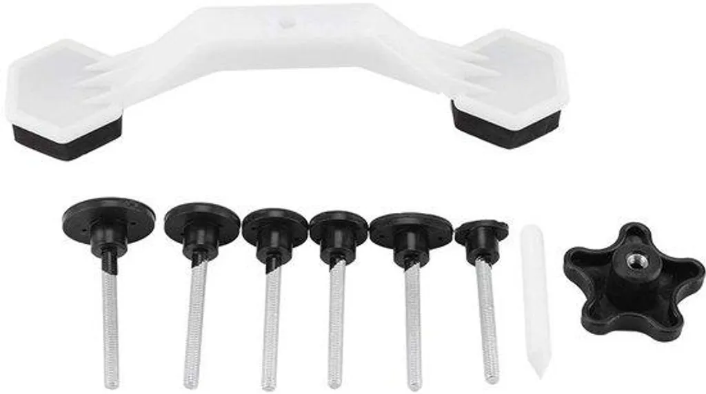 Réparer un frigo rayé ou bosselé avec ce kit de lames d'extraction inox