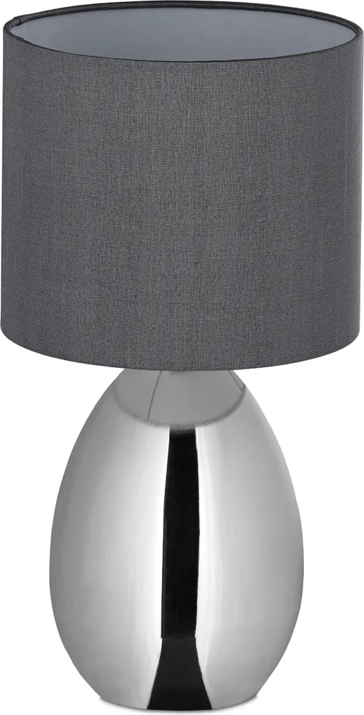Petite lampe tactile argentée idéale pour lire au lit sans chercher le bouton