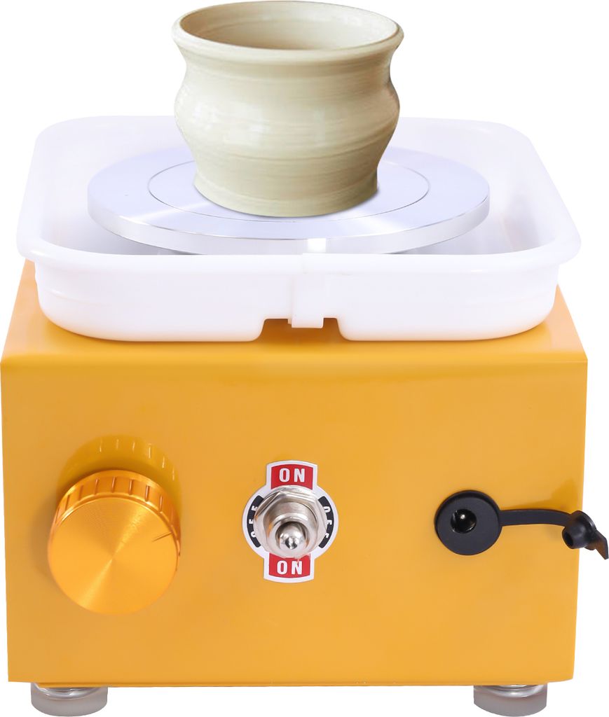 A close-up studio shot of a mini electric pottery wheel with a small ceramic pot on its turntable.