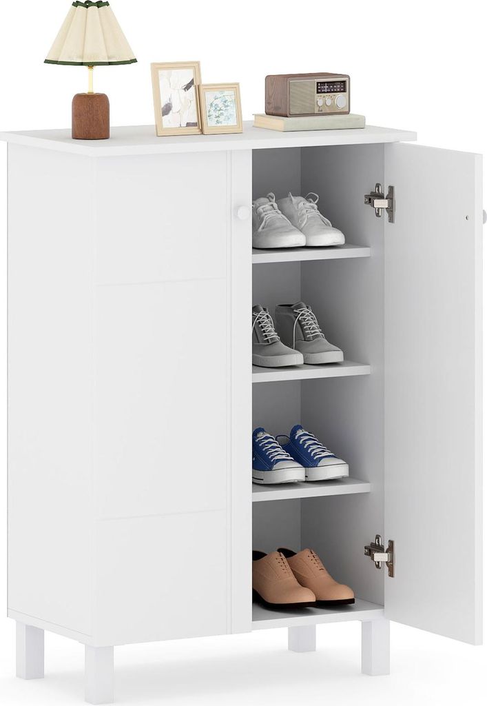 A white shoe cabinet with its doors open, displaying shoes on its shelves.
