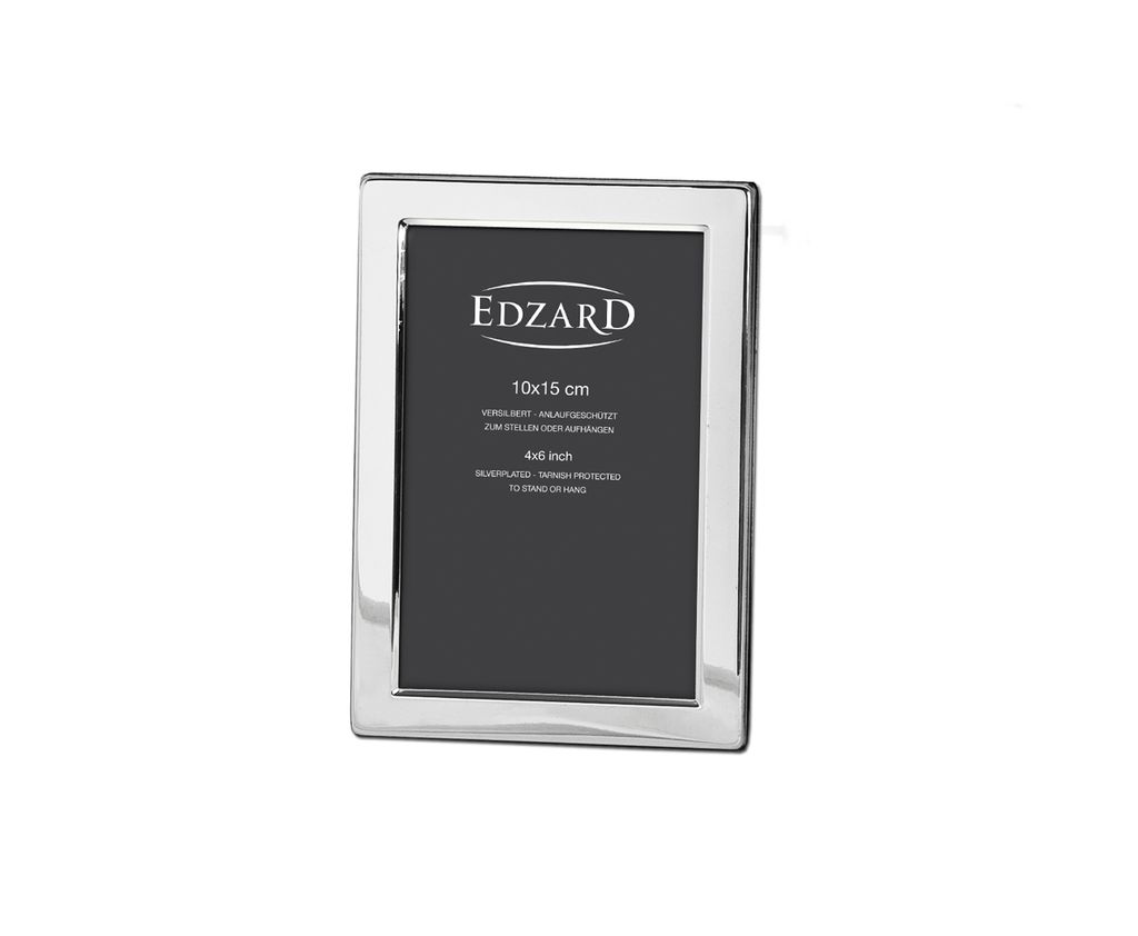 A silver picture frame with text on the dark gray insert.