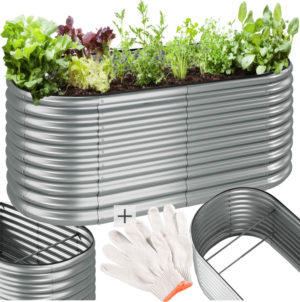 A raised garden bed filled with various plants, along with gardening gloves and a metal frame.