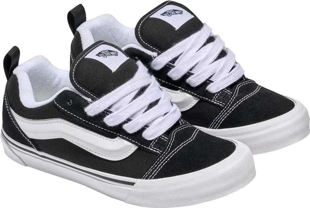 A pair of black and white Vans Knu Skool sneakers.