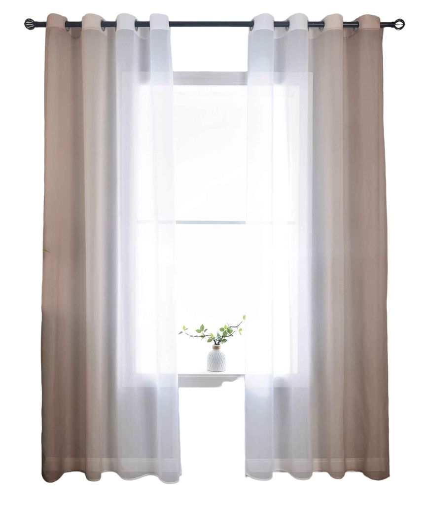 A window with curtains and a small plant on the windowsill.