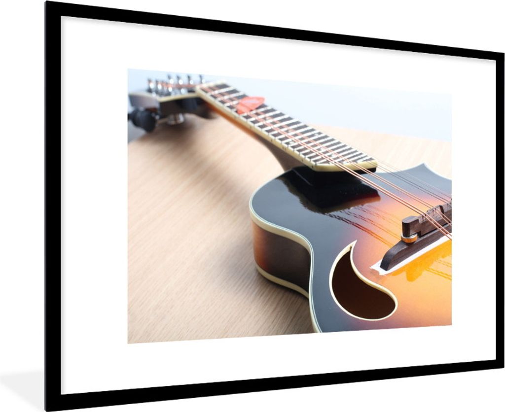 MuchoWow Gerahmtes Poster Eine E-Gitarre auf einem Holzboden 90x60 cm - Poster mit Schwarzem Bilderrahmen Wandposter Rahmen Foto Bilder - Wanddek...