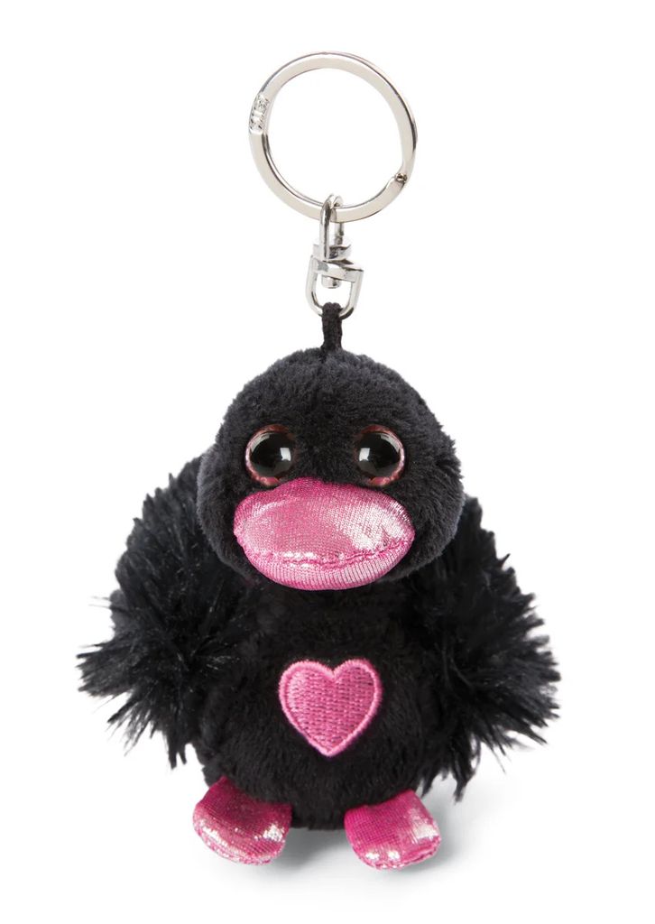 A black plush toy keychain with pink accents, including a heart on its chest and its beak and feet.