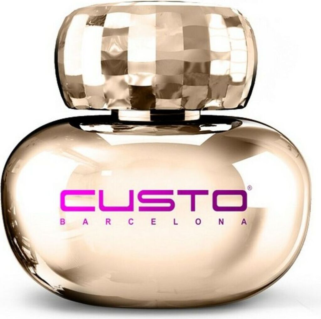 A perfume bottle with a gold-colored body and a silver, faceted cap.