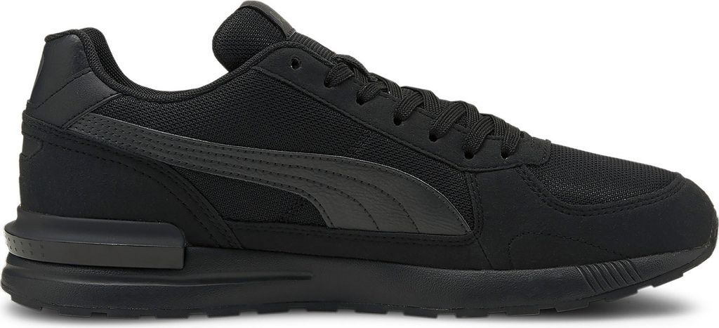 A black Puma sneaker shown from the side against a white background.