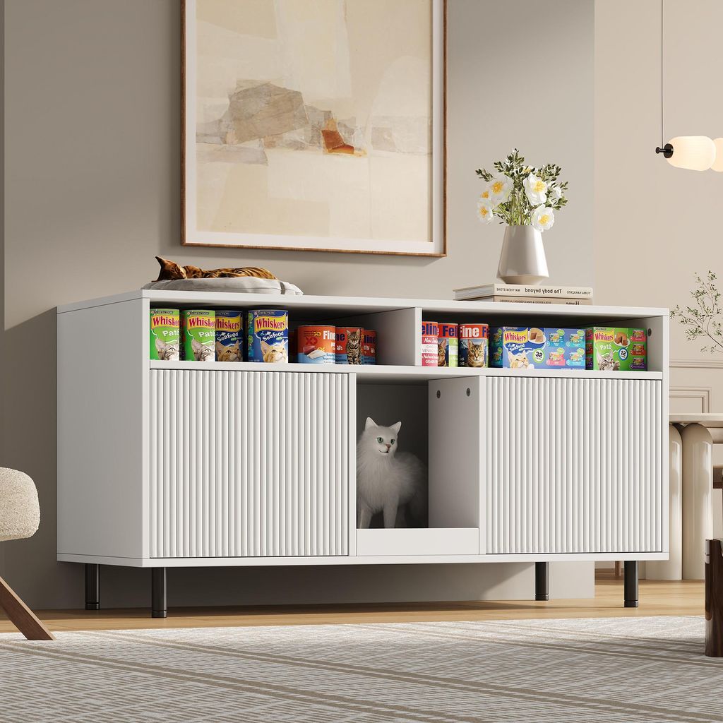 A white sideboard with open shelves and a hidden compartment for a litter box, styled in a modern living room setting.