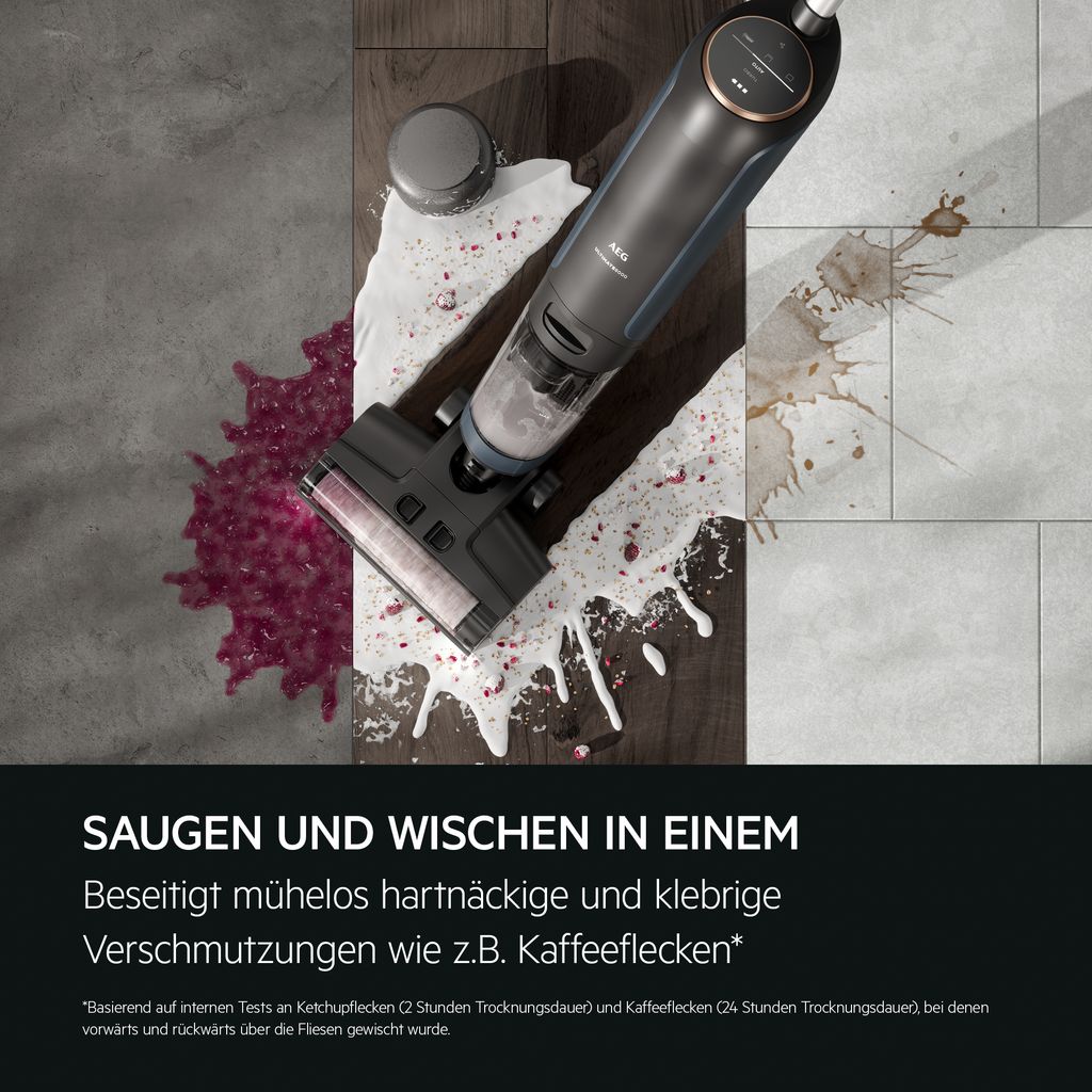 A wet and dry vacuum cleaner is shown cleaning up spills on a floor.
