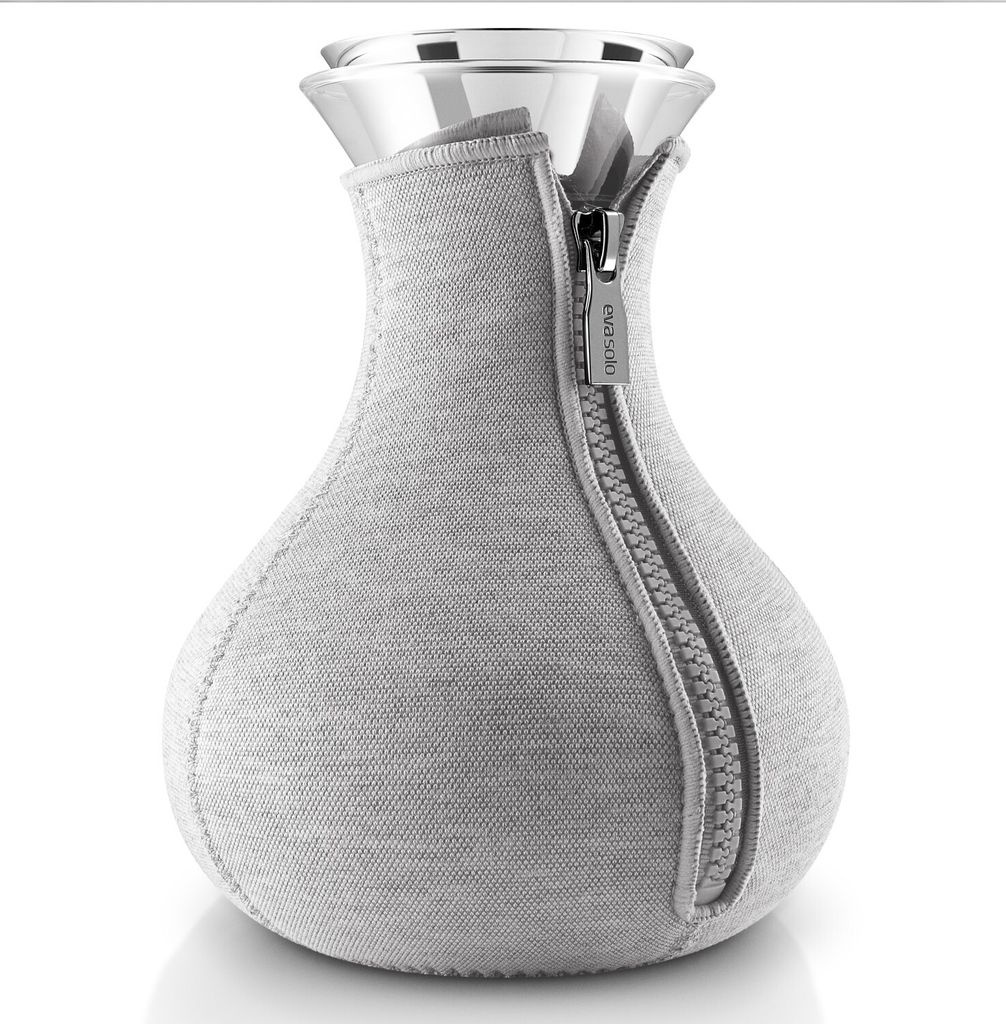 A light gray fabric-covered carafe with a silver zipper and a silver top.