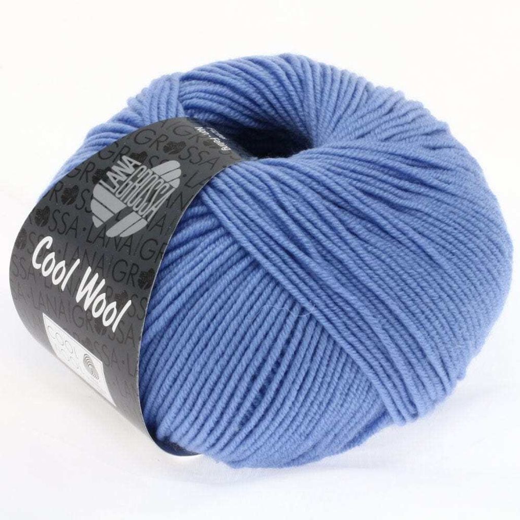 A ball of blue yarn with a label.