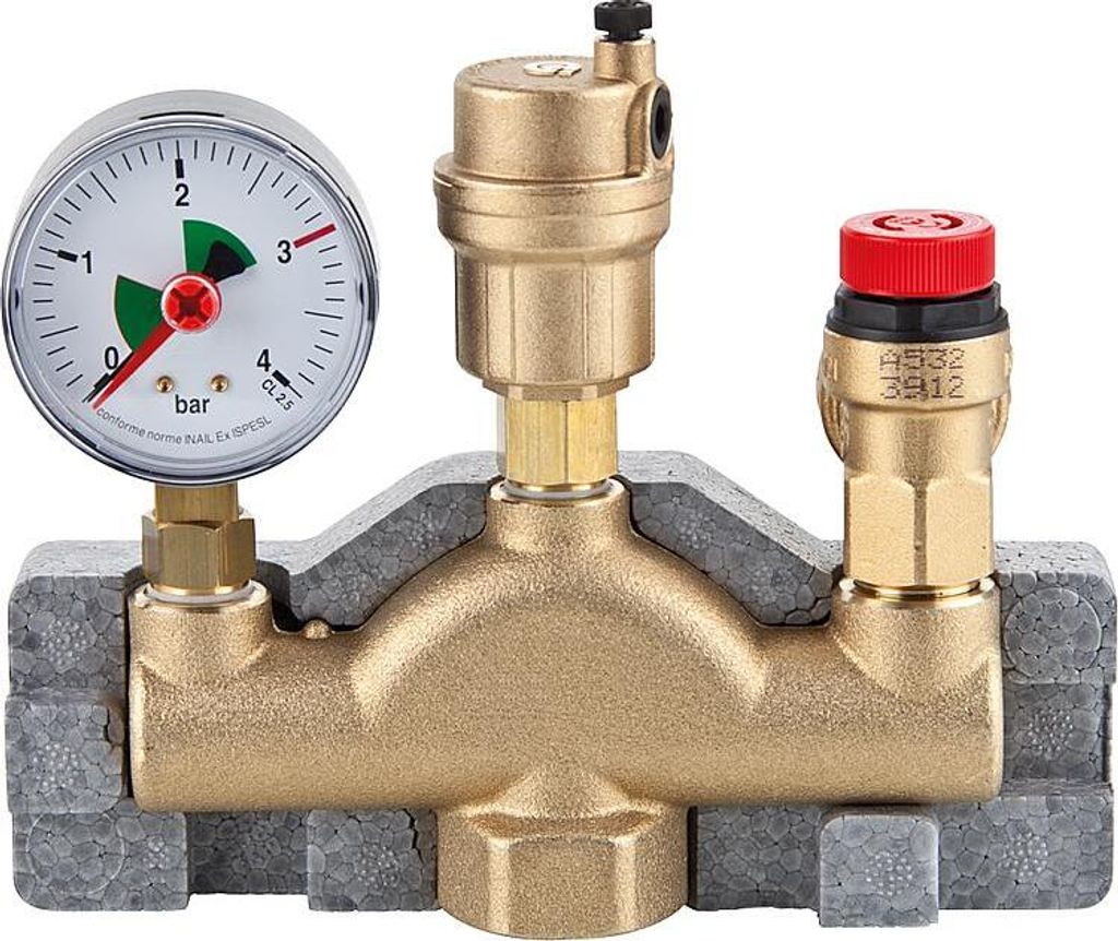 A brass heating system safety group with a pressure gauge and relief valve, mounted on a gray insulating base.