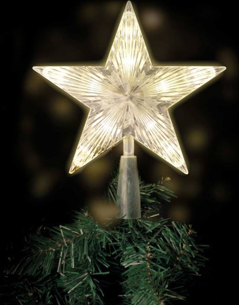 A star-shaped Christmas tree topper with LED lights sits atop a green Christmas tree.