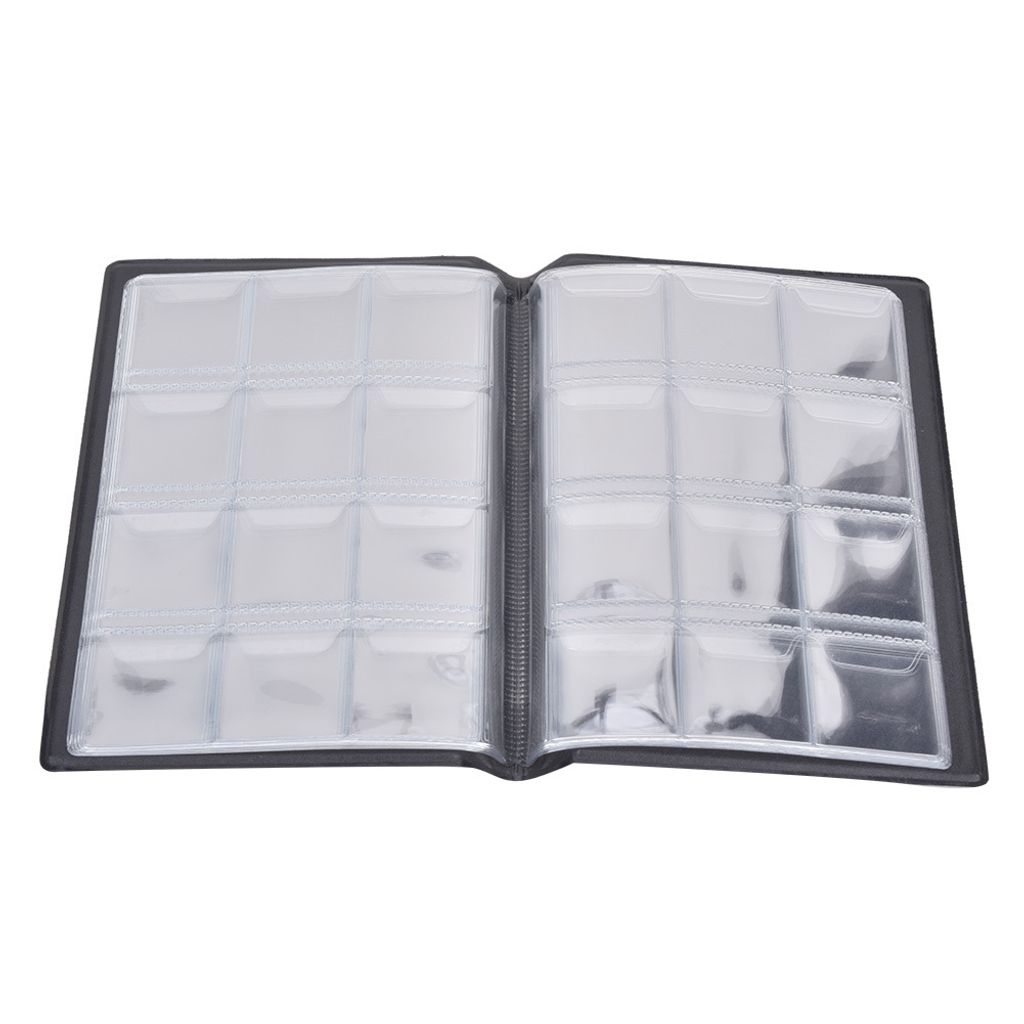An open coin album with empty plastic sleeves on a white background.