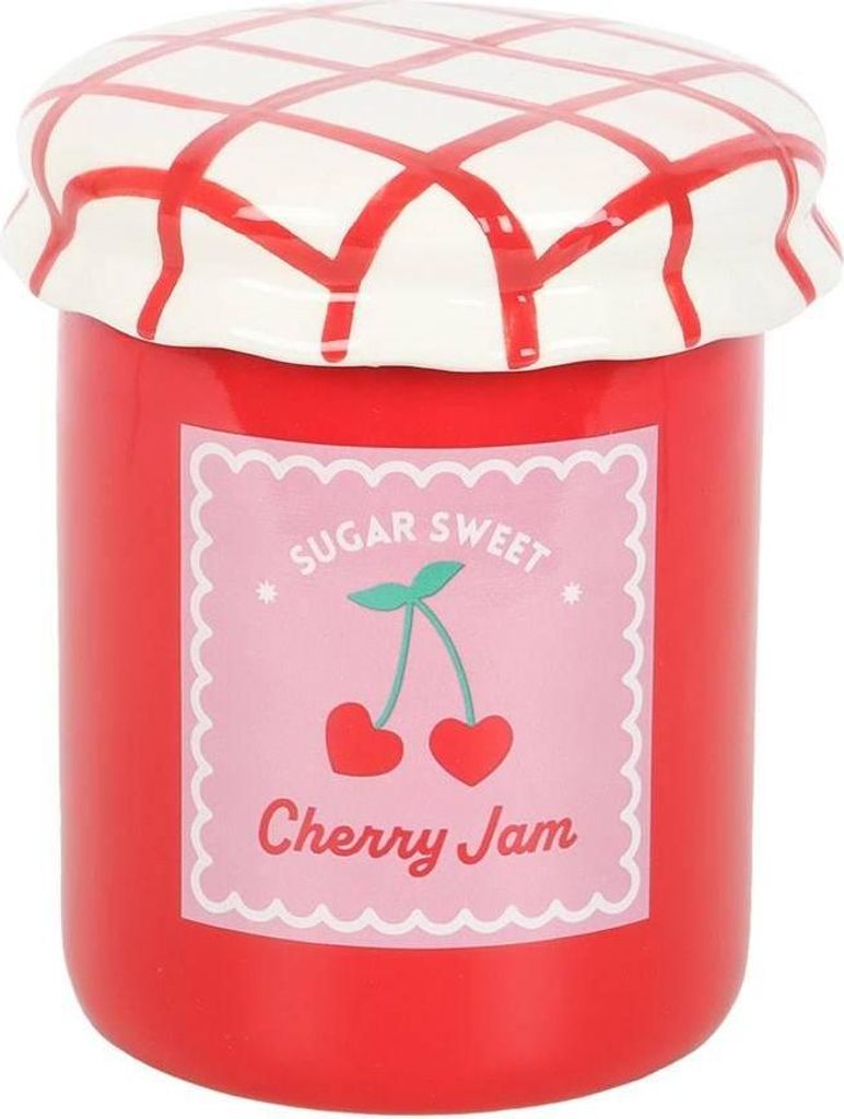 A ceramic jar shaped like a jar of cherry jam, with a lid decorated with a red and white checkered pattern.