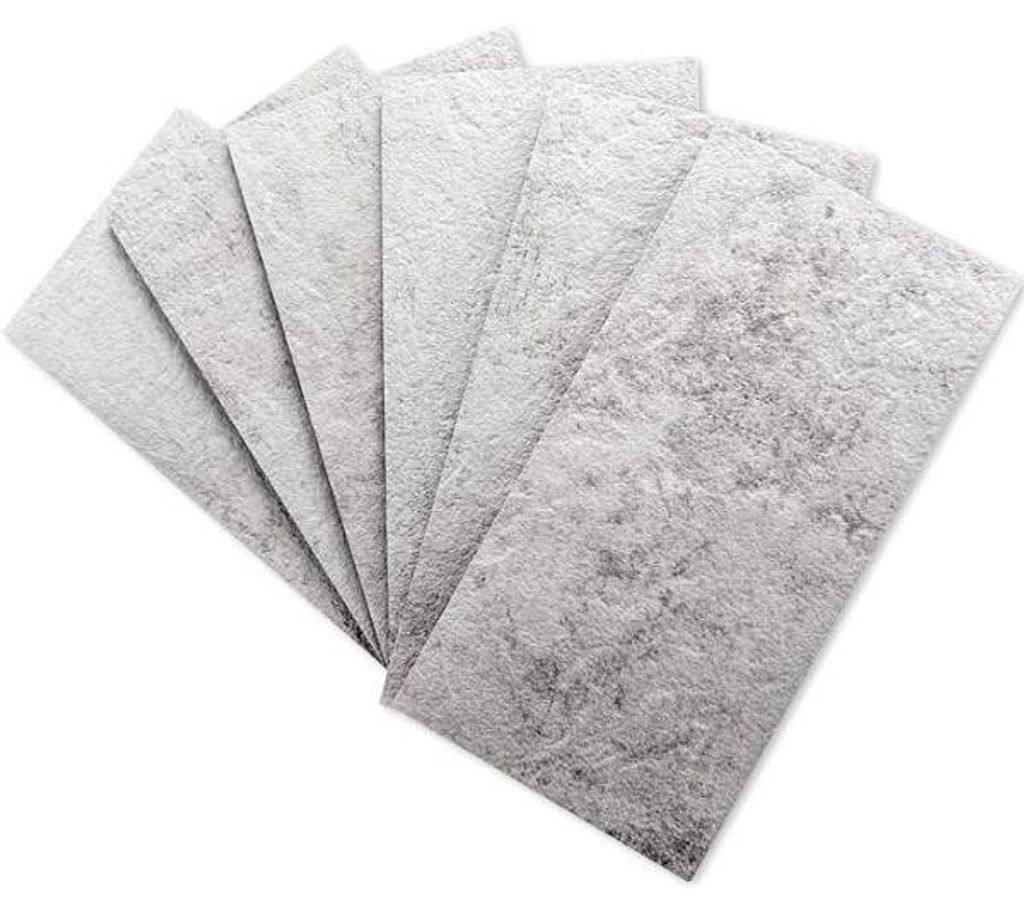 Stack of five rectangular gray filter pads fanned out on a white background