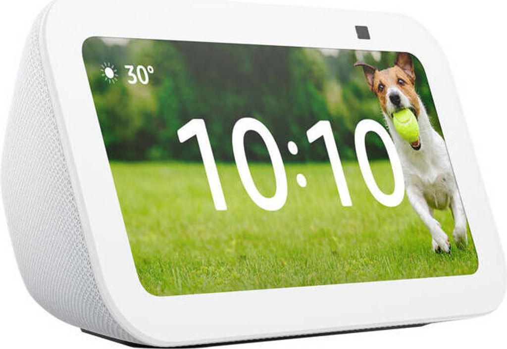 A smart display showing the time and weather, with a dog running in a grassy field.