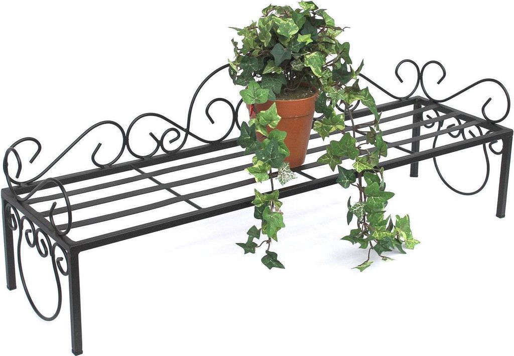 A black metal plant stand with a potted ivy plant on it, set against a white background.