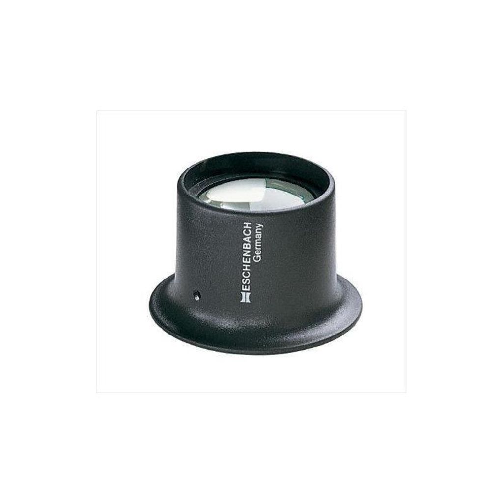 A black loupe with a glass lens sits on a white background.