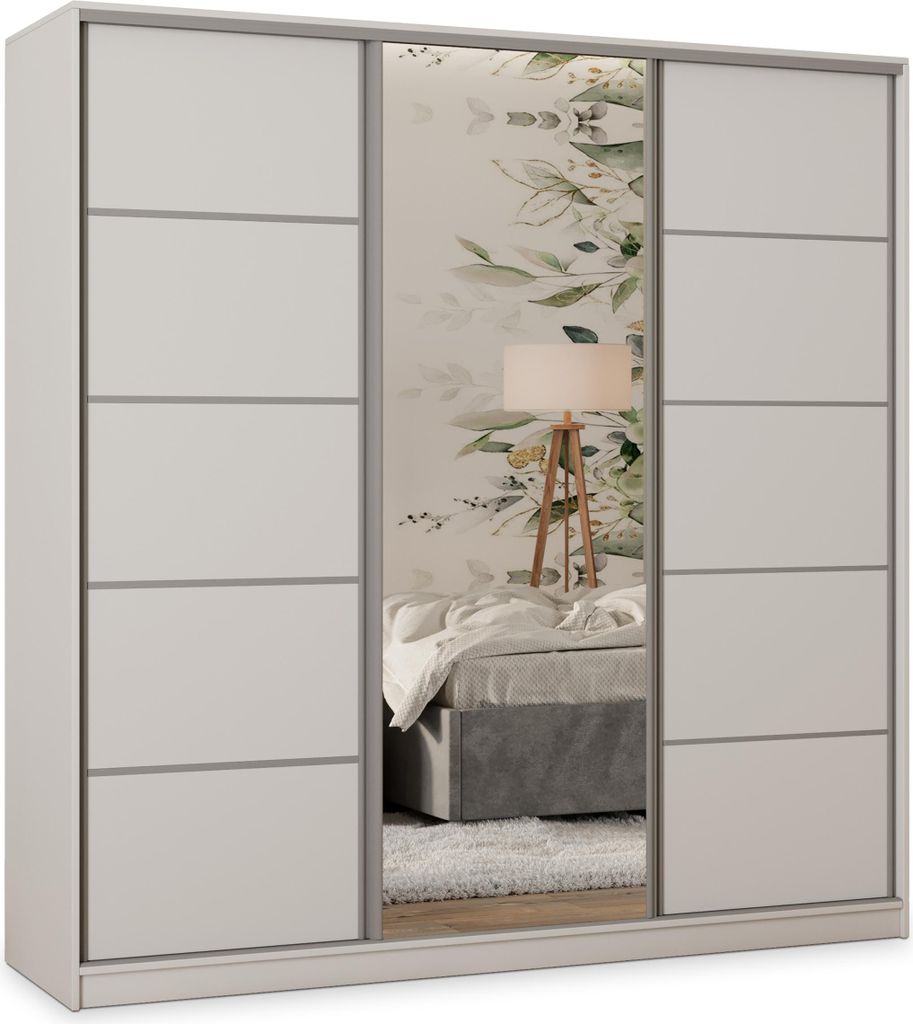A white sliding door wardrobe with a mirrored center panel, reflecting a bedroom scene with a bed and a floor lamp.
