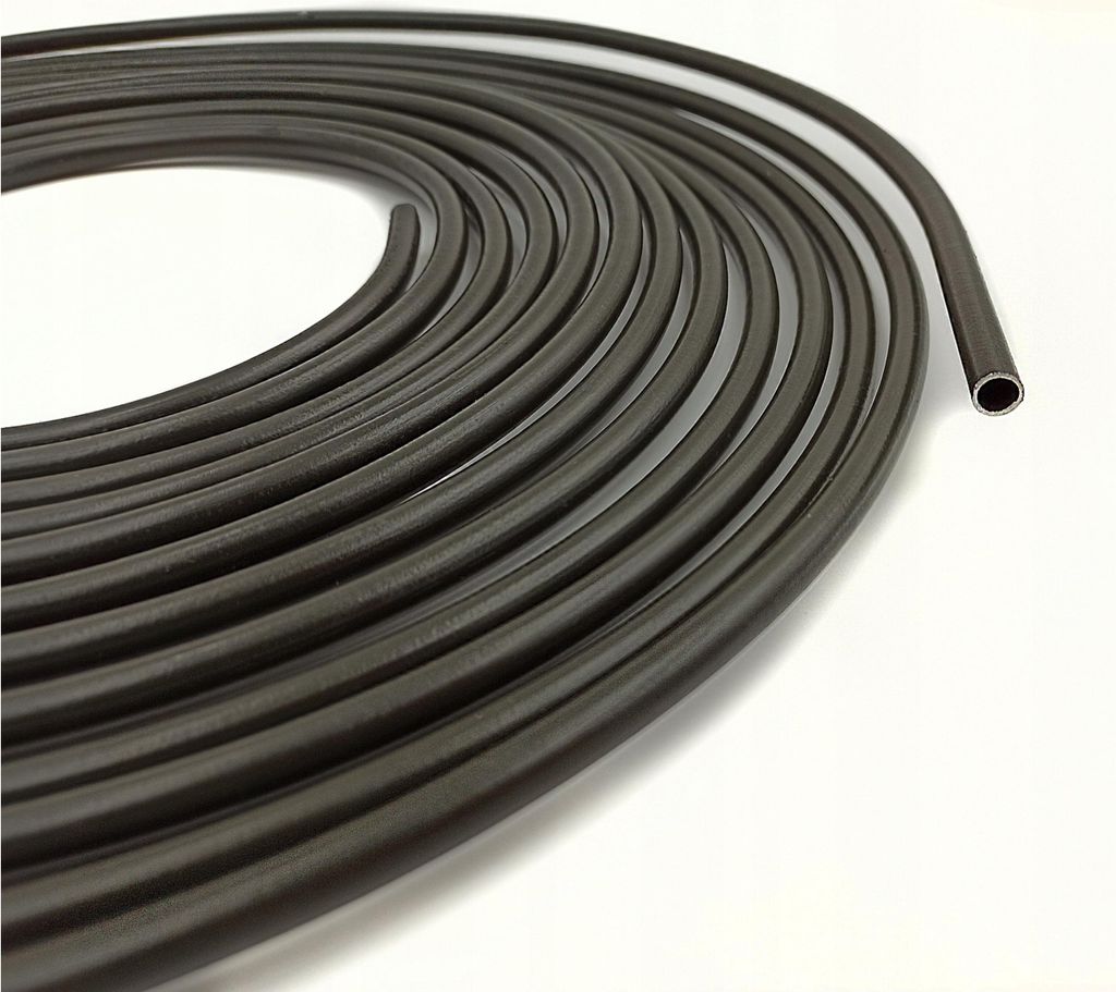 A coiled roll of dark gray tubing on a white background.