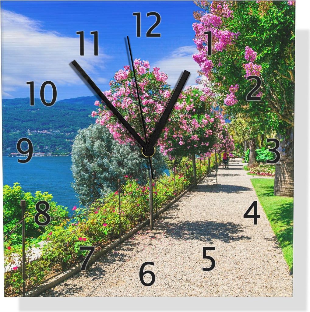 Wallario Design Wanduhr Blütenpromenade am Seeufer aus Aluverbund, Größe 30 x 30 cm