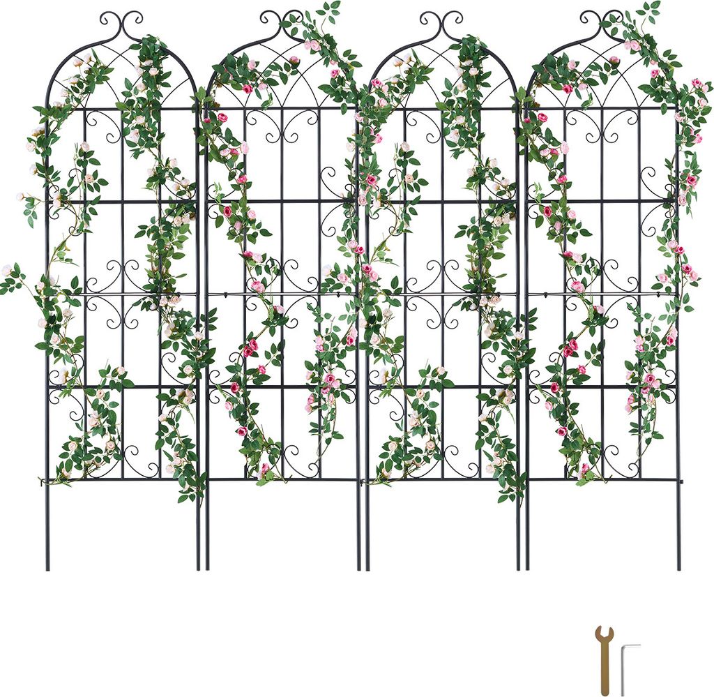 A black metal trellis covered in green vines and pink flowers, set against a white background.
