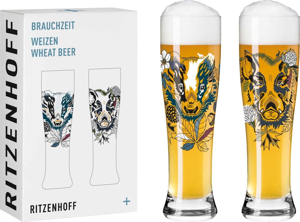 A set of two wheat beer glasses with artistic designs, presented next to their packaging.